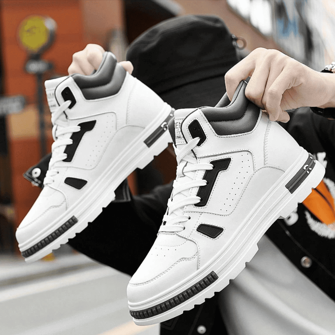 FORCIANO VADER white height increasing sneakers with black accents, shown as a pair being held in a casual setting.