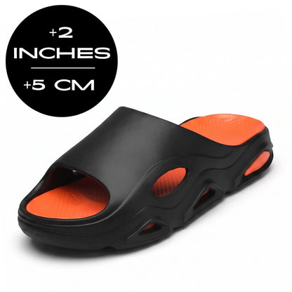Black-and-orange FORCIANO VECTOR EVA height increasing shoes shown from a front three-quarter angle with an up to 5 cm / 2" height graphic.