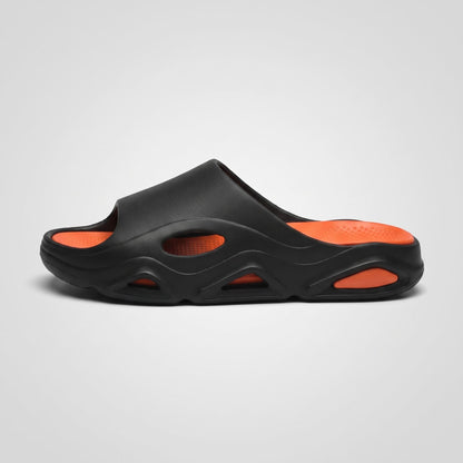 Black-and-orange FORCIANO VECTOR EVA sandals shown in a full side profile, featuring the sculpted sole of the height increasing shoes.