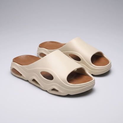 Cream-and-brown FORCIANO VECTOR height increasing shoes shown as a pair of EVA sandals from an angled front view.