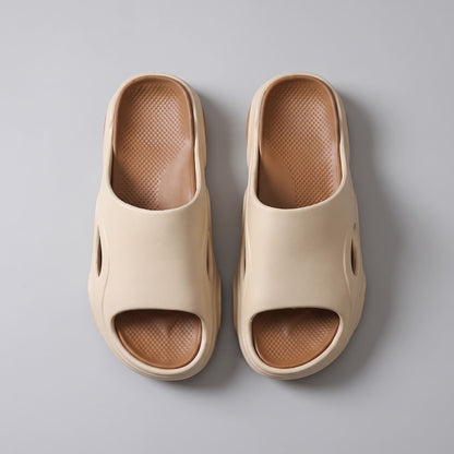 FORCIANO VECTOR height increasing shoes shown from above as a cream-and-brown pair of EVA sandals with textured brown footbeds.