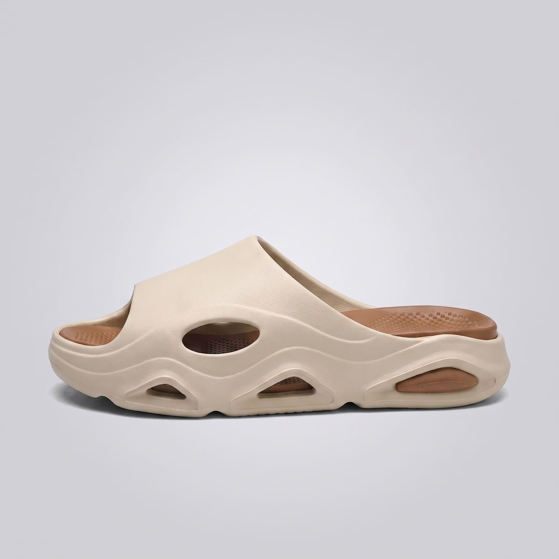 FORCIANO VECTOR height increasing shoes in cream-and-brown EVA, displayed as a single sandal in a clean side-profile view.