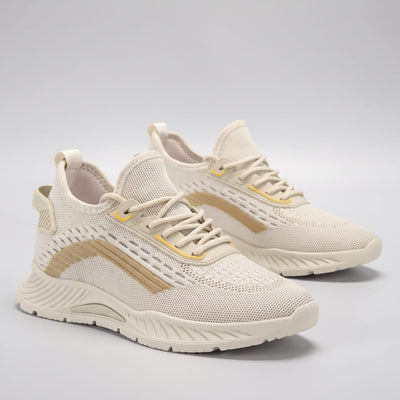 Pair of FORCIANO VISCONTI beige height increasing sneakers with air mesh uppers displayed from a front three-quarter studio angle.