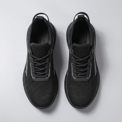 FORCIANO VISCONTI black height increasing sneakers shown as a pair from above with air mesh uppers, lace-up fronts and visible openings.