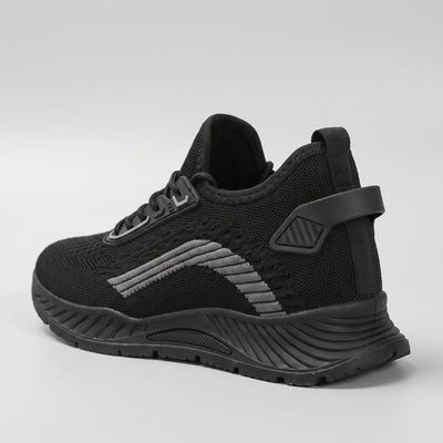 Rear three-quarter view of FORCIANO VISCONTI black height increasing sneakers showing the air mesh upper, heel support and sculpted sole.