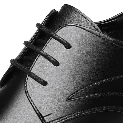 FORCIANO WINDSOR black Height-Increasing Shoes shown in a close-up of the leather upper, lace area, stitching and smooth polished finish.