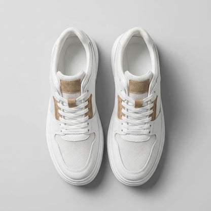 Top view of FORCIANO ZENITH white sneakers showing breathable air mesh uppers, white laces and tan tongue accents.