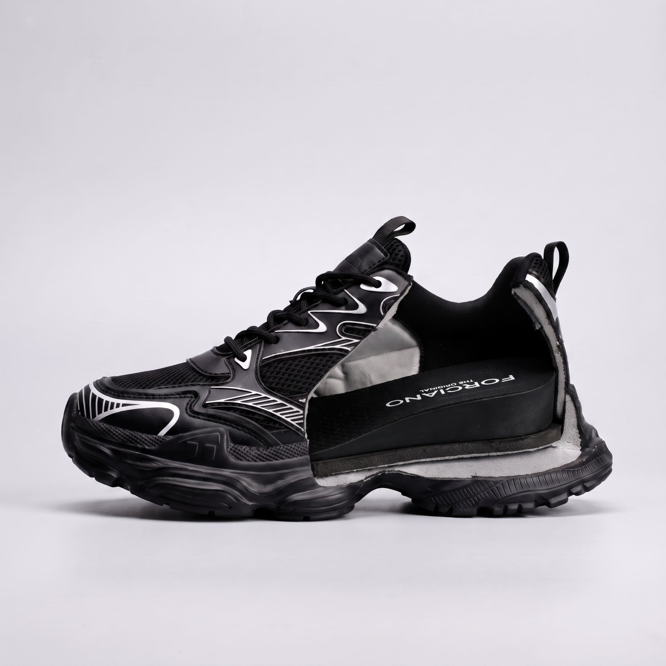 FORCIANO ZEPHYRA Black Height Increasing Sneakers for Women shown in a side cutaway revealing the internal lift beneath the breathable mesh upper.