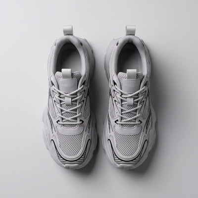 FORCIANO ZEPHYRA Gray Height Increasing Sneakers for Women shown in a top-view pair with breathable mesh, laces and black graphic accents.