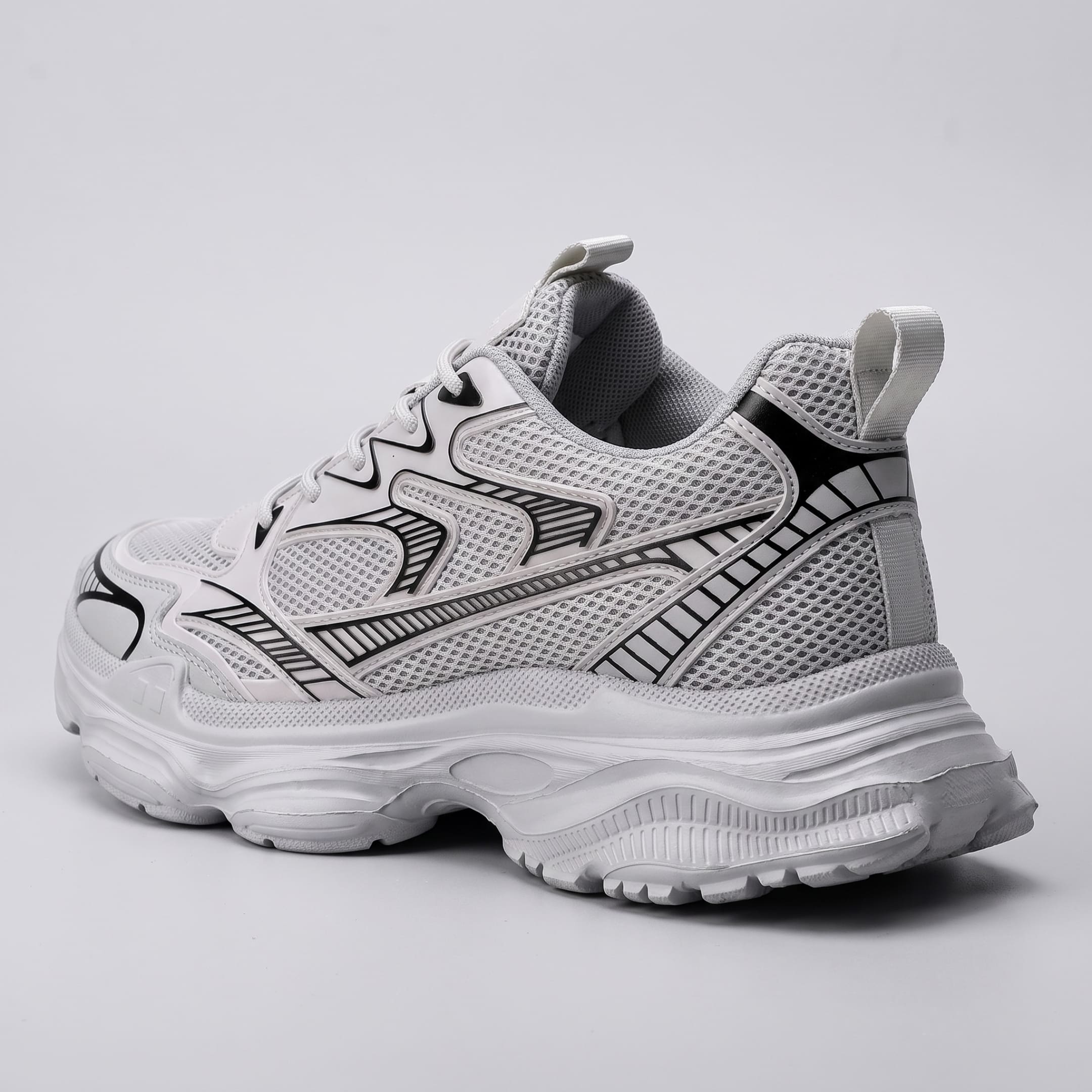 FORCIANO ZEPHYRA Gray Height Increasing Sneakers for Women shown from a rear three-quarter angle with breathable mesh and sculpted sole visible.